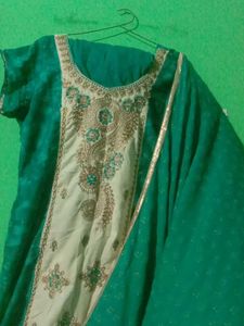 Women Green Suit And Salwar.....