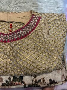 Backless golden choli