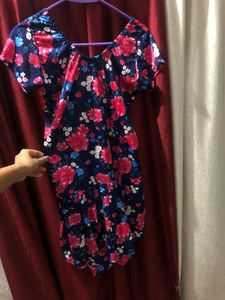 Swim Suit With Attached Shorts.