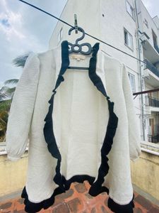 Elegant Ruffled Cardigan