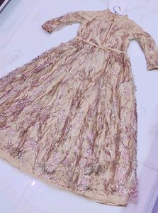 Golden Color Gown With Glitter Design