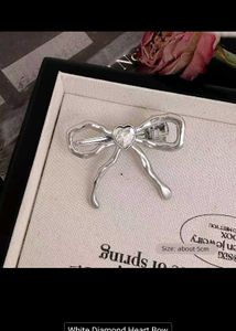 Metal transparent heart crystal bow hair clip