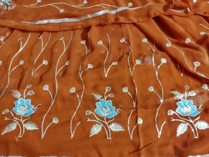 Beautiful Design Light Rust Color Saree