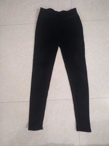 Black denim jeggings.