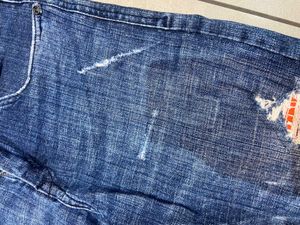 Distressed Denim Jeans