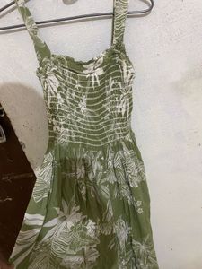 green and white floral printed jumpsuit