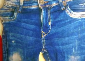 Ripped Blue Denim Jeans