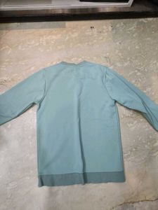 green sweatshirt