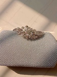 Silver Clutch With A Strap