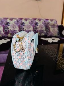 Sky Blue Sling Bags.