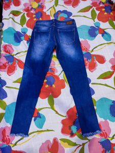 Ripped Knee Denim Jeans