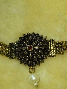 Neckpiece And Earpiece