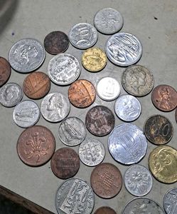 35 assorted foreign coins
