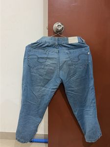 Ripped Denim Capri Jeans