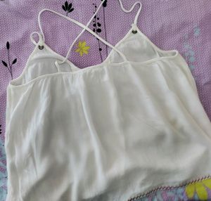 sleeveless top ,bust size-36,goes well on jeans and skirts