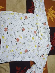 A Flowy White Floral Top