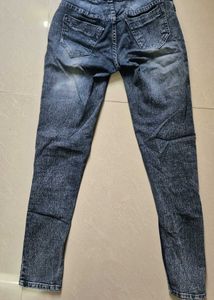 Trendy Distressed Denim Jeans with Chevron Design