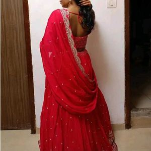 Elegant dark pink lehenga with Embellished Blouse