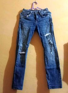 Ripped Blue Denim Jeans