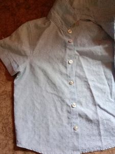 Primark half sleeves printed light blue shirt.. front button closure