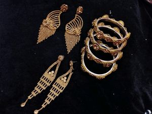 Golden Earrings(pack Of Two) & kangan(4) Piece