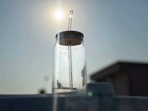 Eco-Friendly Glass Bottles with Straw Lid
