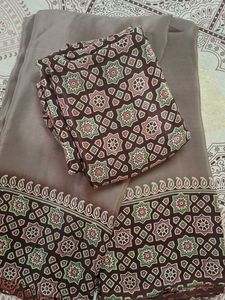 Elegant modal silk saree with blouse piece