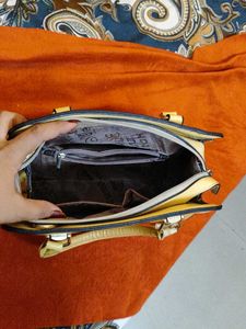 butter yellow handbag