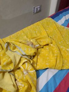 Yellow Saree with beautiful Flowers