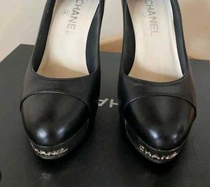 CHANEL BLACR SILVER COTED HEEL