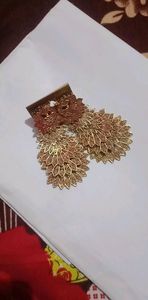 nice earings red and gold colour in party wear