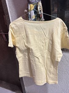 Pale Yellow Top with Cutouts