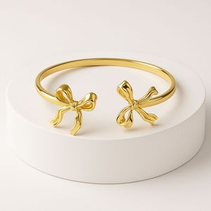 Anti Tarnished Gold Bow Hand Cuff