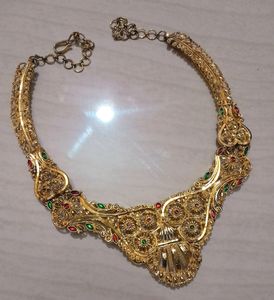 Gold Plated Set .Gorgeous look With Red And green meenakari Work.