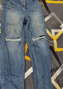Ripped Knee Jeans