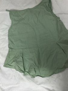 Flared Pista Green Sleeveless Top