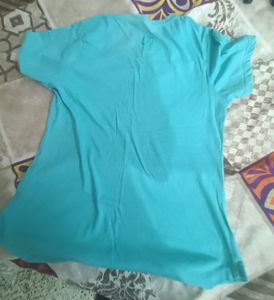 Gym top with slight stains pictures attached
