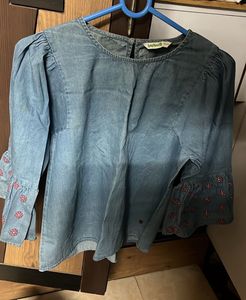 a top which is hardly worn, with bell sleeves