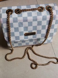 White And Gray Sling Bag