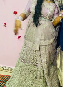 Bridal lehanga with aari work tassels 💜
