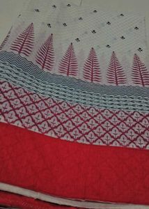 Elegant white and red Printed Saree