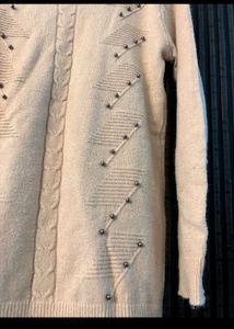 Beige colour woollen turtle for women
