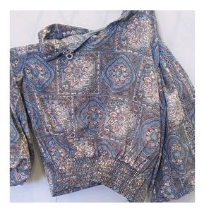 A multicolored top.