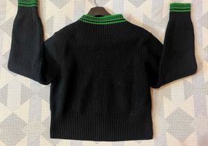 Black Sweater With Green Margins