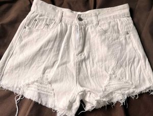Torn White Denim Shorts