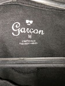 MEN&#39;S BLACK T SHIRT WITH GARCON PRINT AND FUNKY DESIGN AT BOTTOM