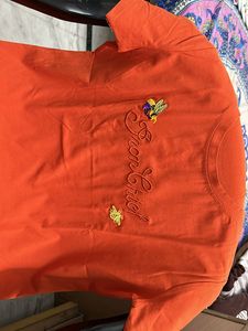 Basic Orange Top  With A Little Print In Center