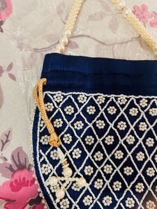 Elegant Heavy Blue Pearl Potli Bag with Tassels