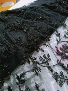 new beautiful embroidered black stone net saree.
