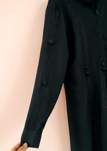 Elegant Black Abaya with Subtle Detailing – Modest